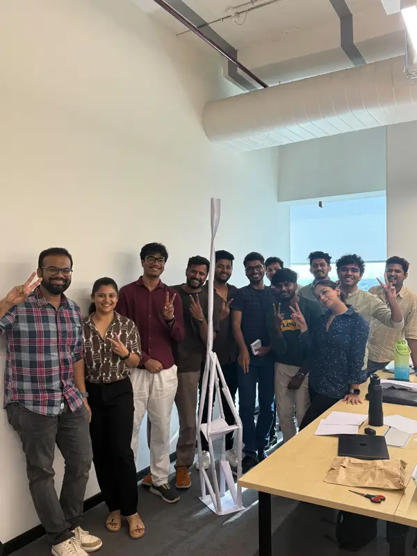 CultureMonkey team members together at the office
